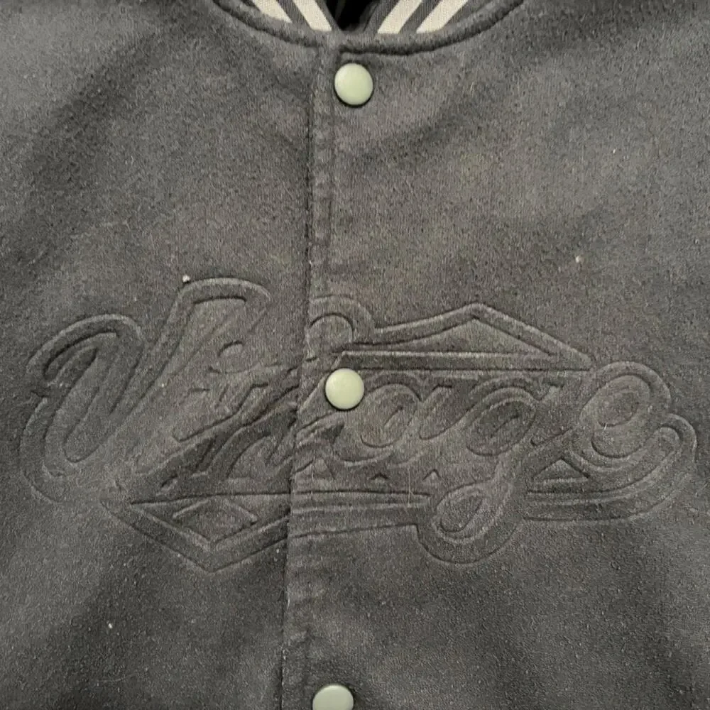 Black varsity jacket with white
